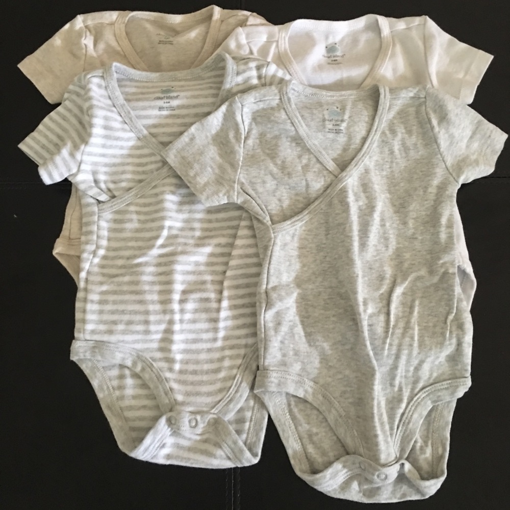 4 pack of Cloud Island Onesies - 3-6
